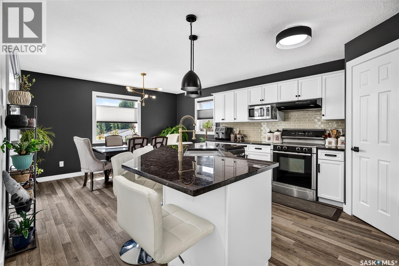 69 Goldenglow Drive, Moose Jaw, SK - Indoor Photo Showing Kitchen With Stainless Steel Kitchen With Upgraded Kitchen