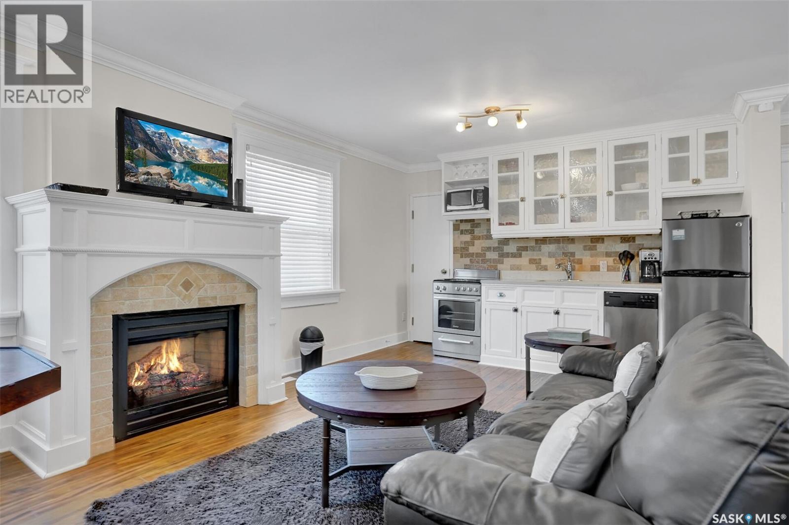 2216 Lorne Street, Regina, SK - Indoor Photo Showing Living Room With Fireplace