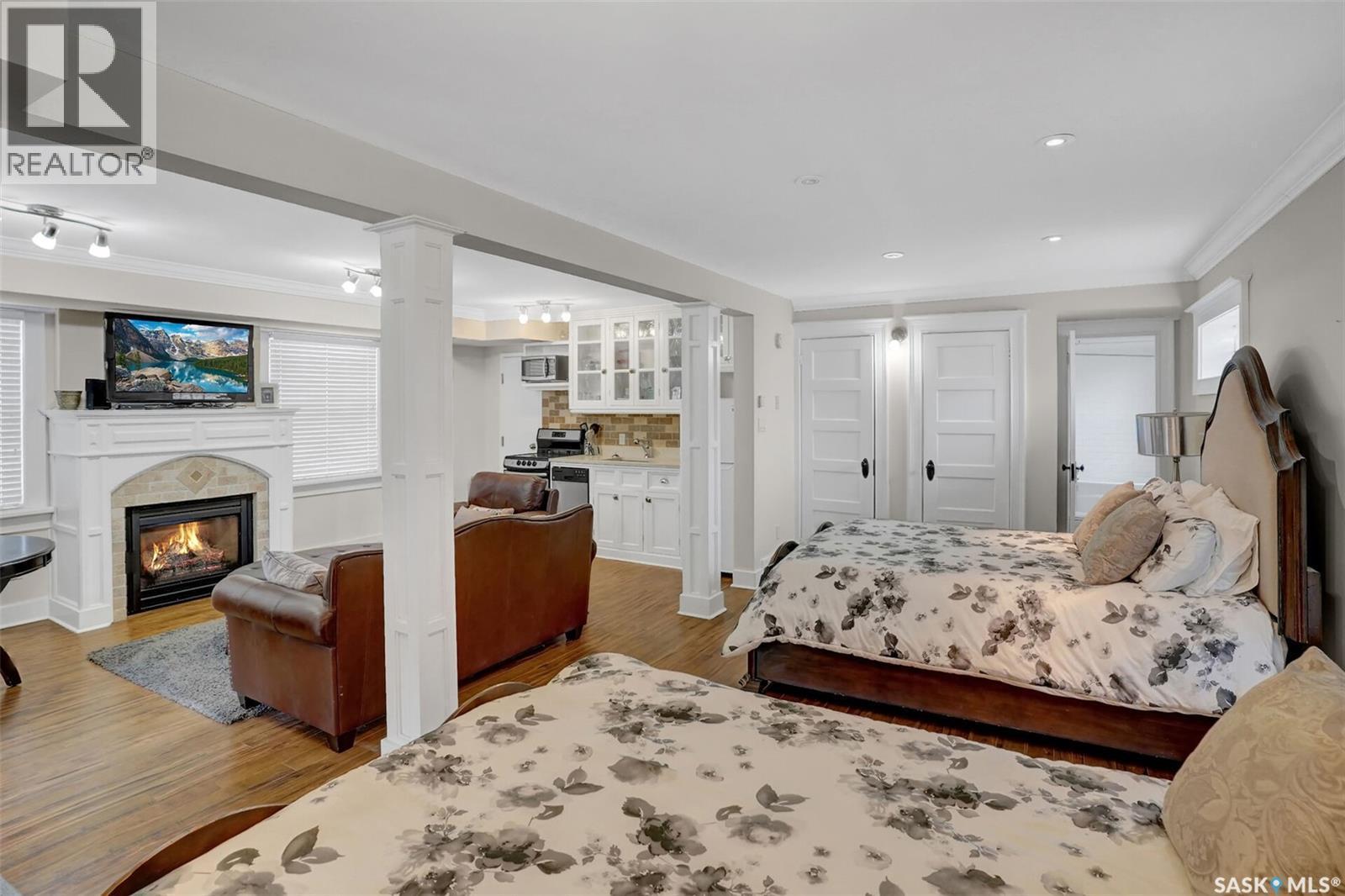 2216 Lorne Street, Regina, SK - Indoor Photo Showing Bedroom With Fireplace