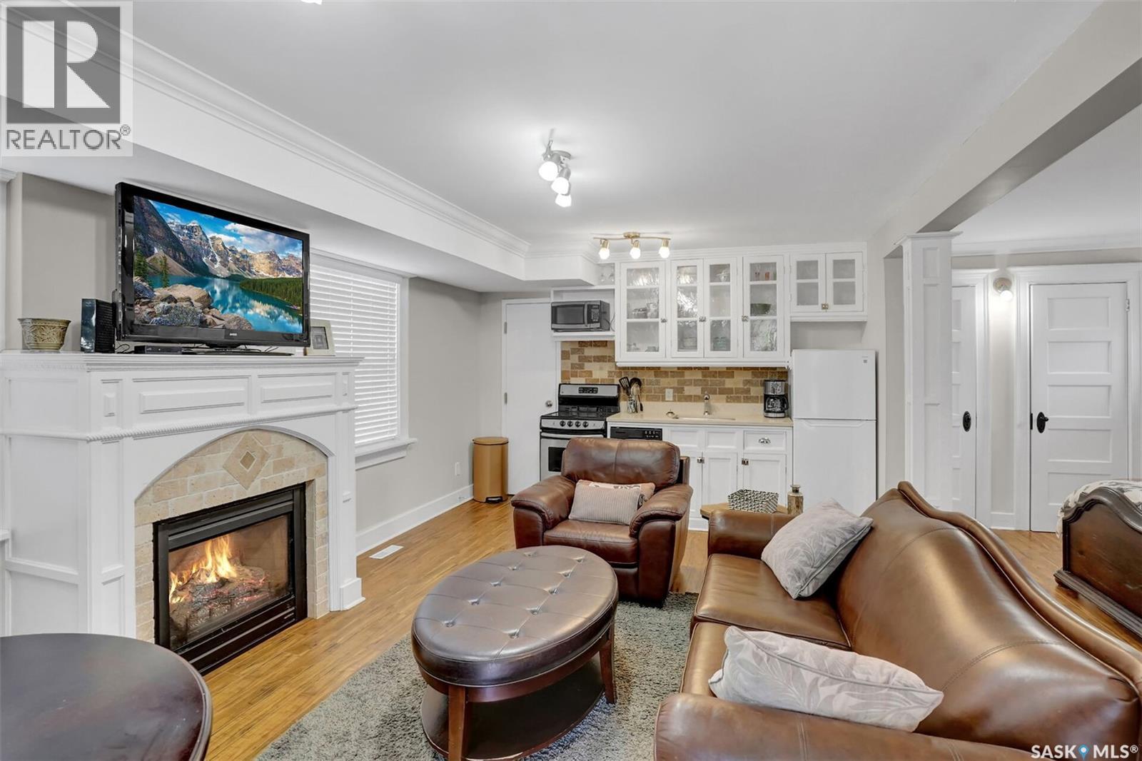 2216 Lorne Street, Regina, SK - Indoor Photo Showing Living Room With Fireplace