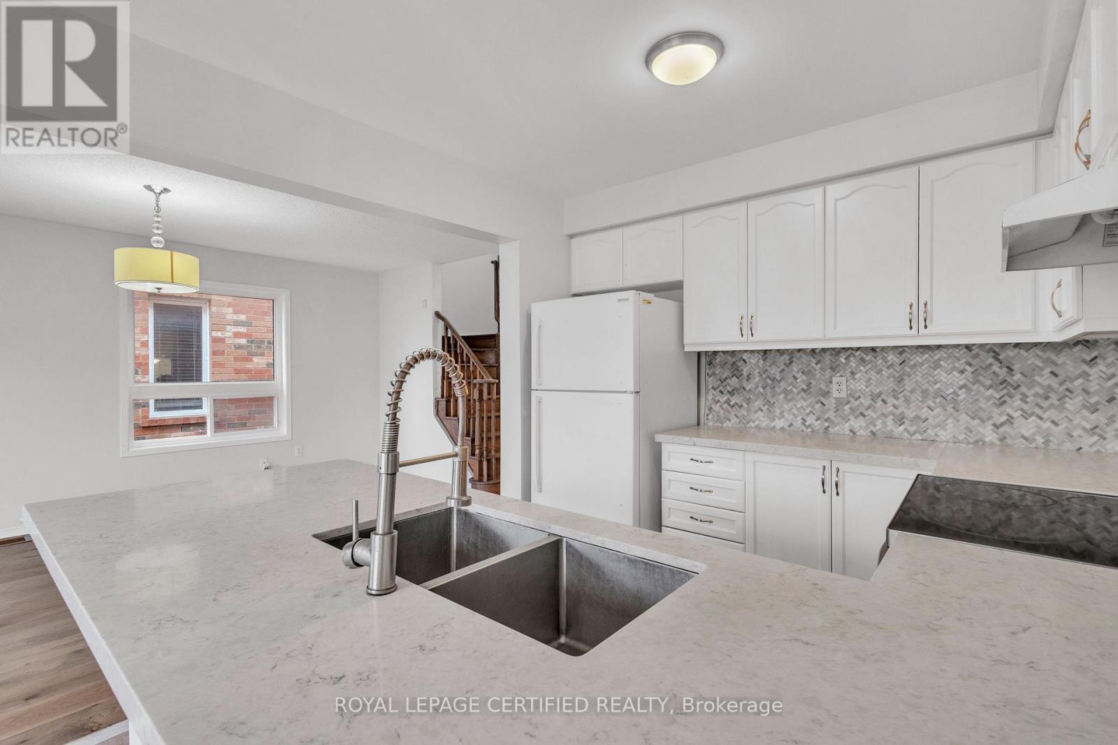 114 Botavia Downs Drive, Brampton, ON - Indoor Photo Showing Kitchen With Double Sink