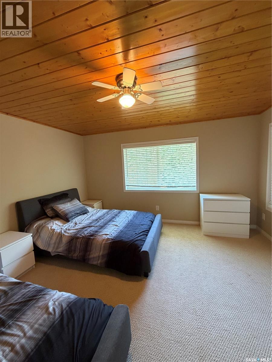 60 Estates Drive, Elk Ridge, SK - Indoor Photo Showing Bedroom
