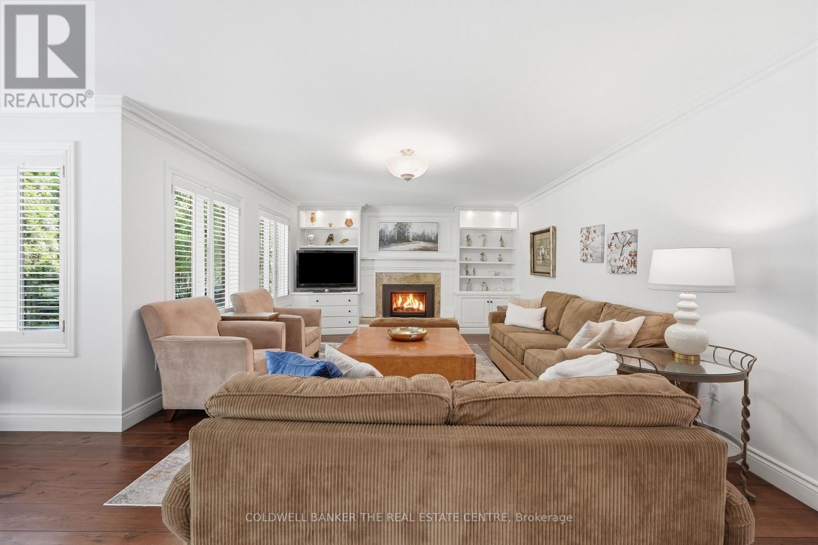 Family room with Fireplace - 49 Falling Leaf Court, Aurora, ON - Indoor Photo Showing Living Room With Fireplace