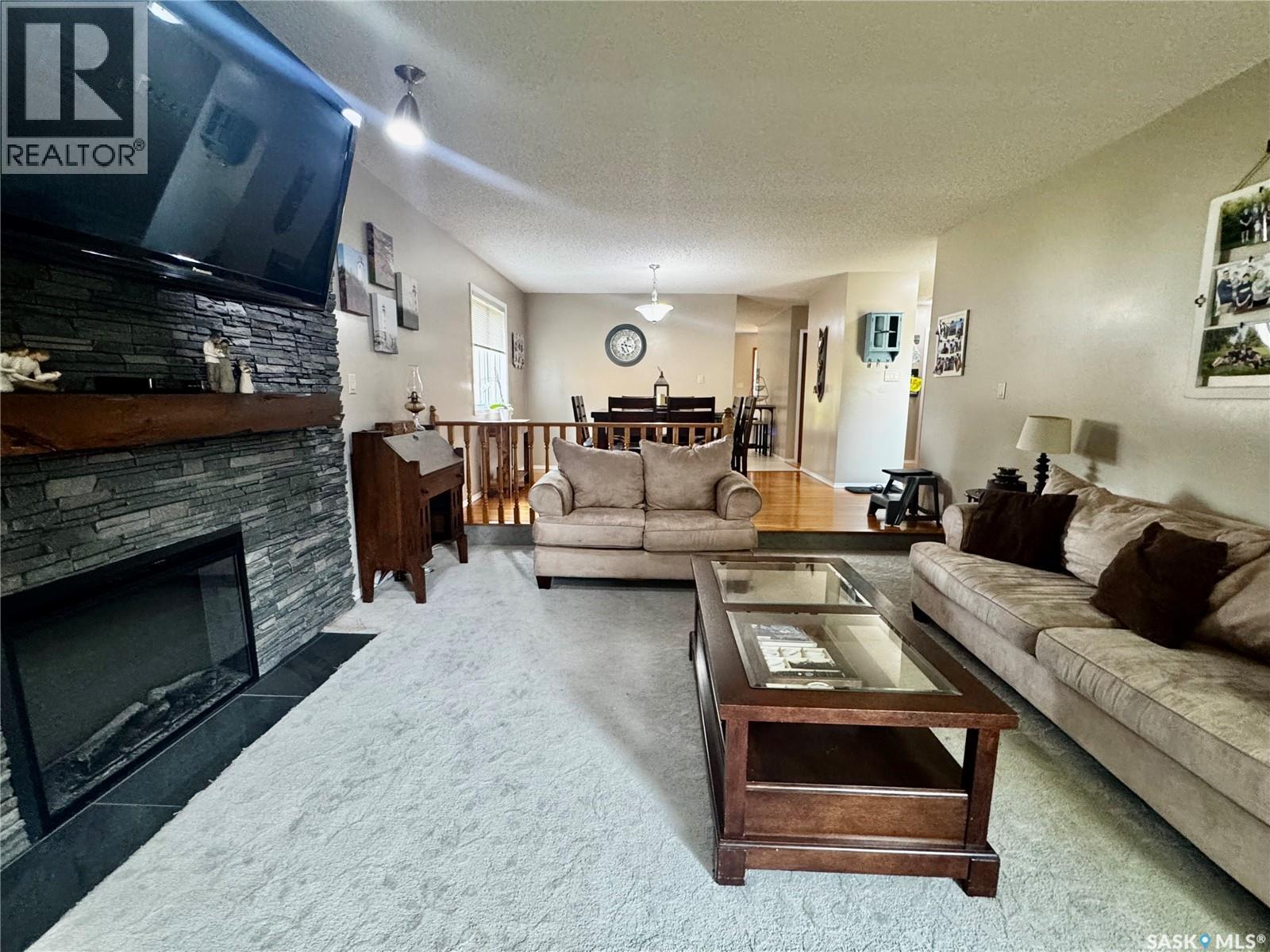 34 Blackwell Crescent, Yorkton, SK - Indoor Photo Showing Living Room With Fireplace