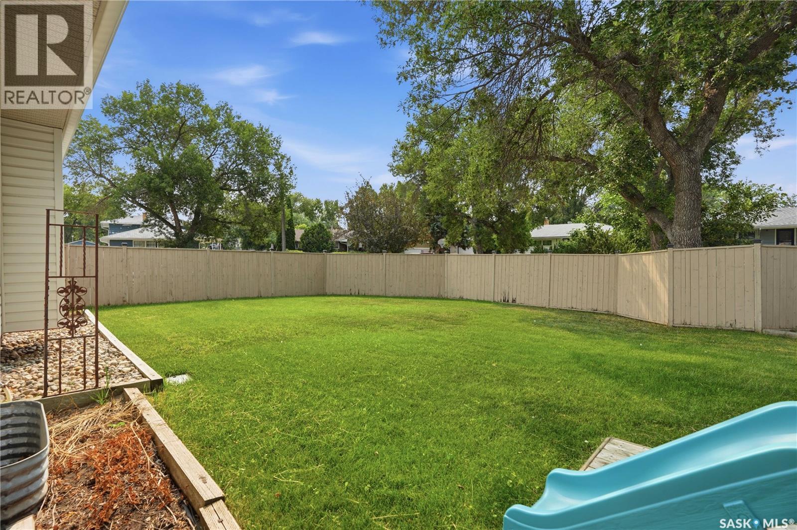 144 Orchard Crescent, Regina, SK - Outdoor With Backyard