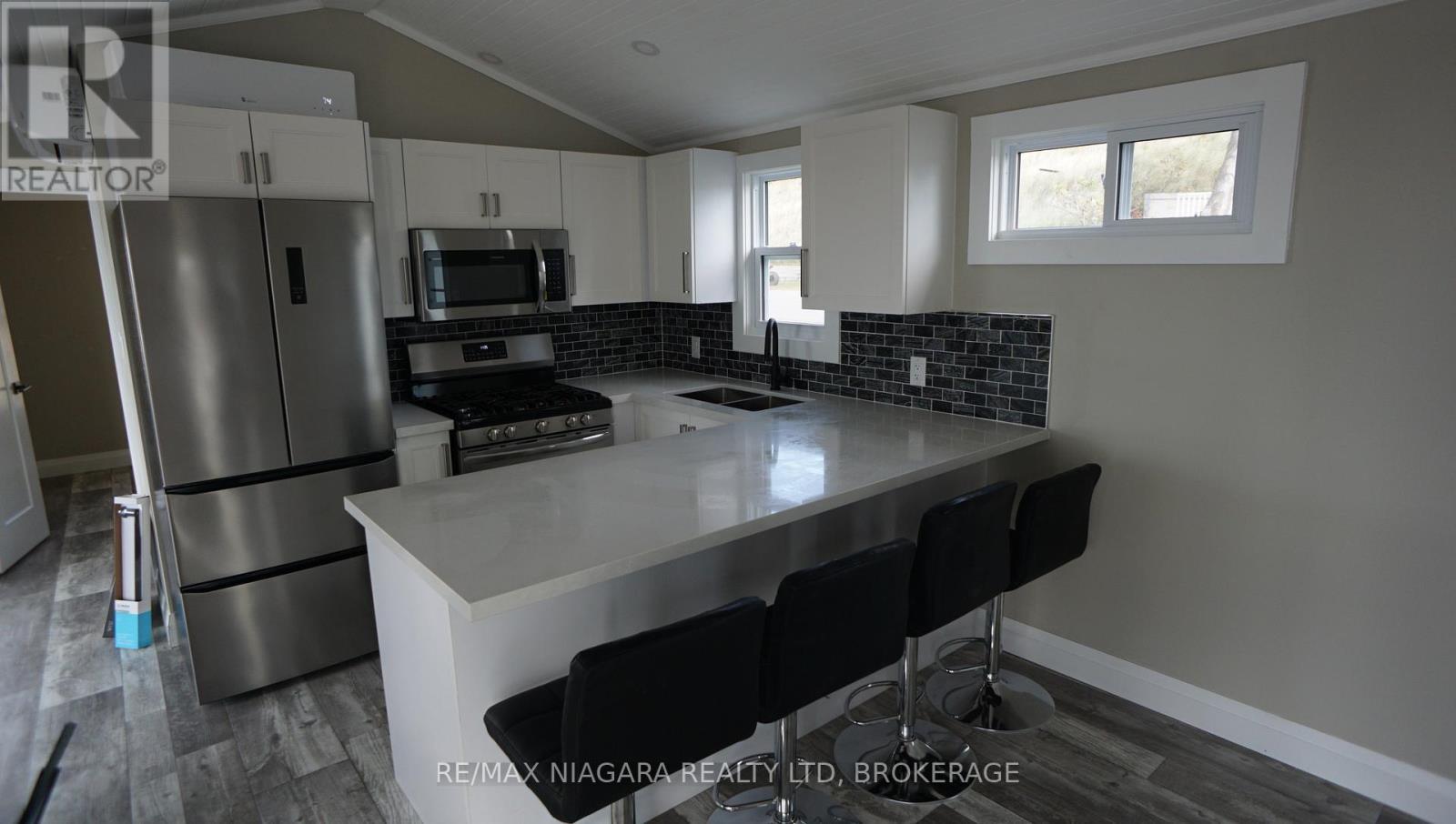 14 Sunset, Port Colborne (Sherkston), ON - Indoor Photo Showing Kitchen With Double Sink