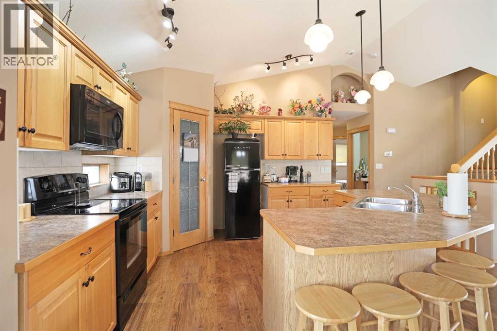 372 Lake Stafford Drive E, Brooks, AB - Indoor Photo Showing Kitchen With Double Sink