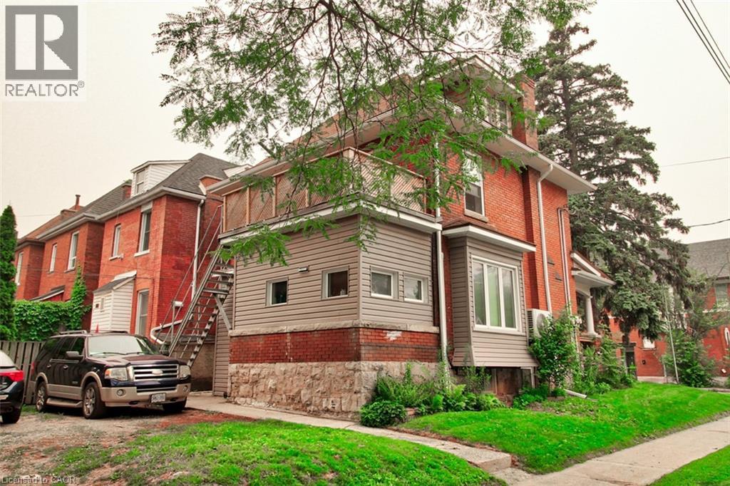 Rear of Structure and Parking Area - 189 Prospect Street S, Hamilton, ON - Outdoor