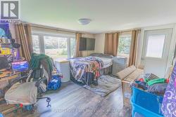 Front family rm. currently used as bedroom. - 