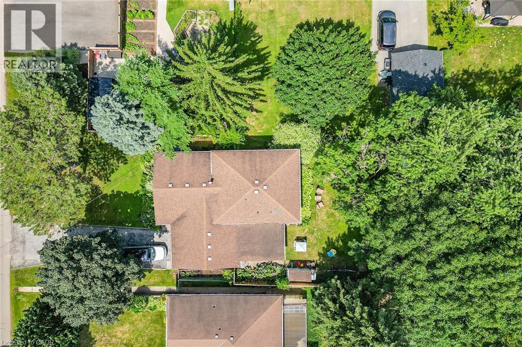 Aerial perspective showcasing a residential property with surrounding greenery - 3 Orchard Parkway, Grimsby, ON - Outdoor