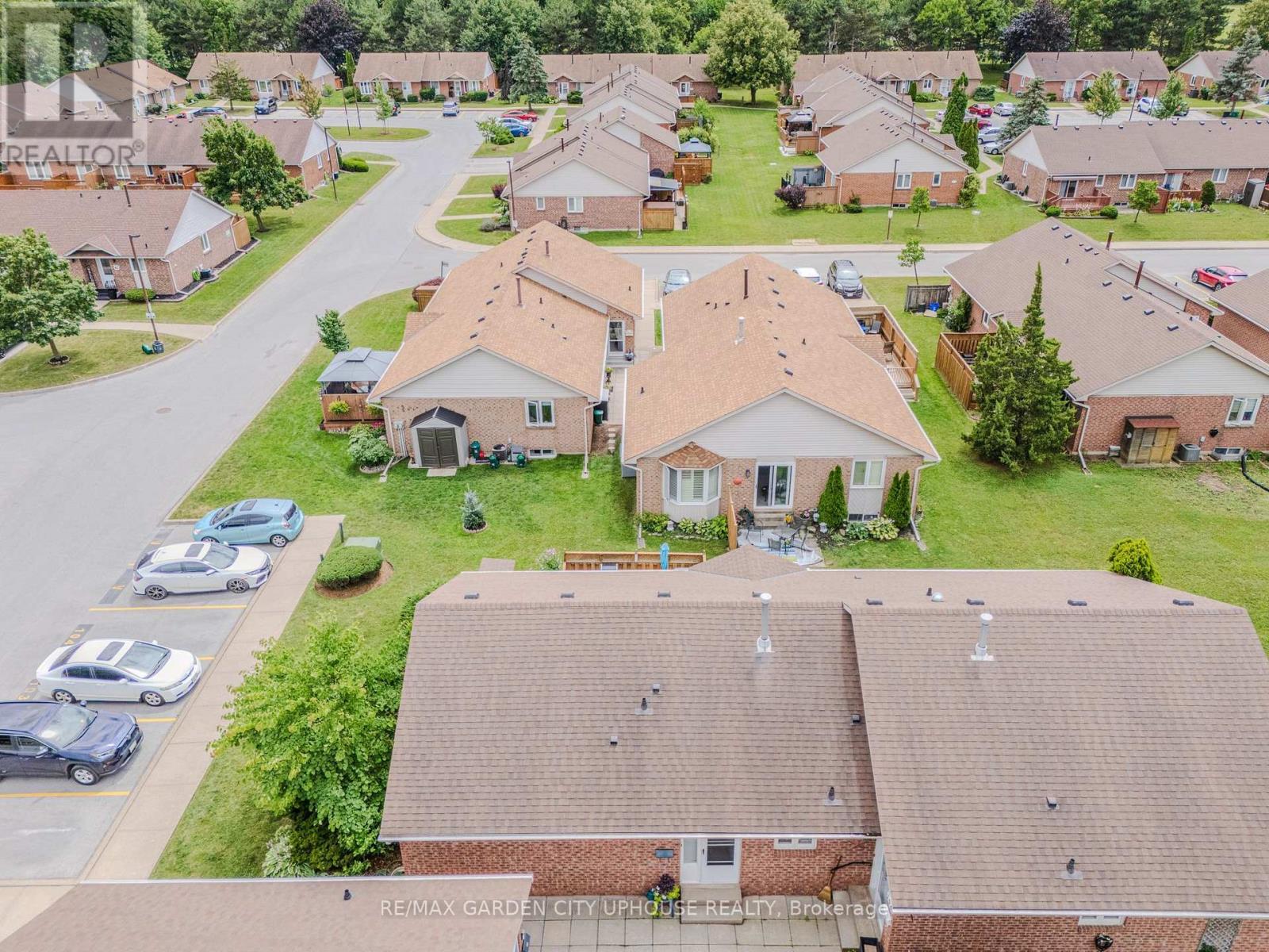 Overview of Unit 103 & parking sport - 103 - 122 Bunting Road, St. Catharines (E. Chester), ON - Outdoor With View