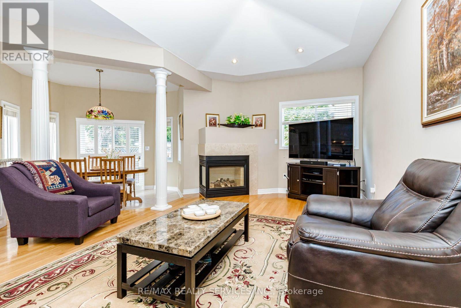 128 Valleywood Boulevard, Caledon, ON - Indoor Photo Showing Living Room With Fireplace