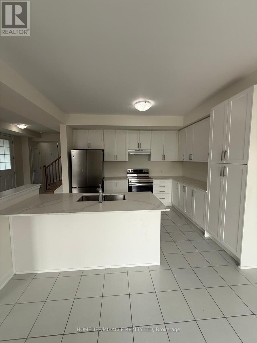 127 Oakmont Drive, Loyalist, ON - Indoor Photo Showing Kitchen With Double Sink