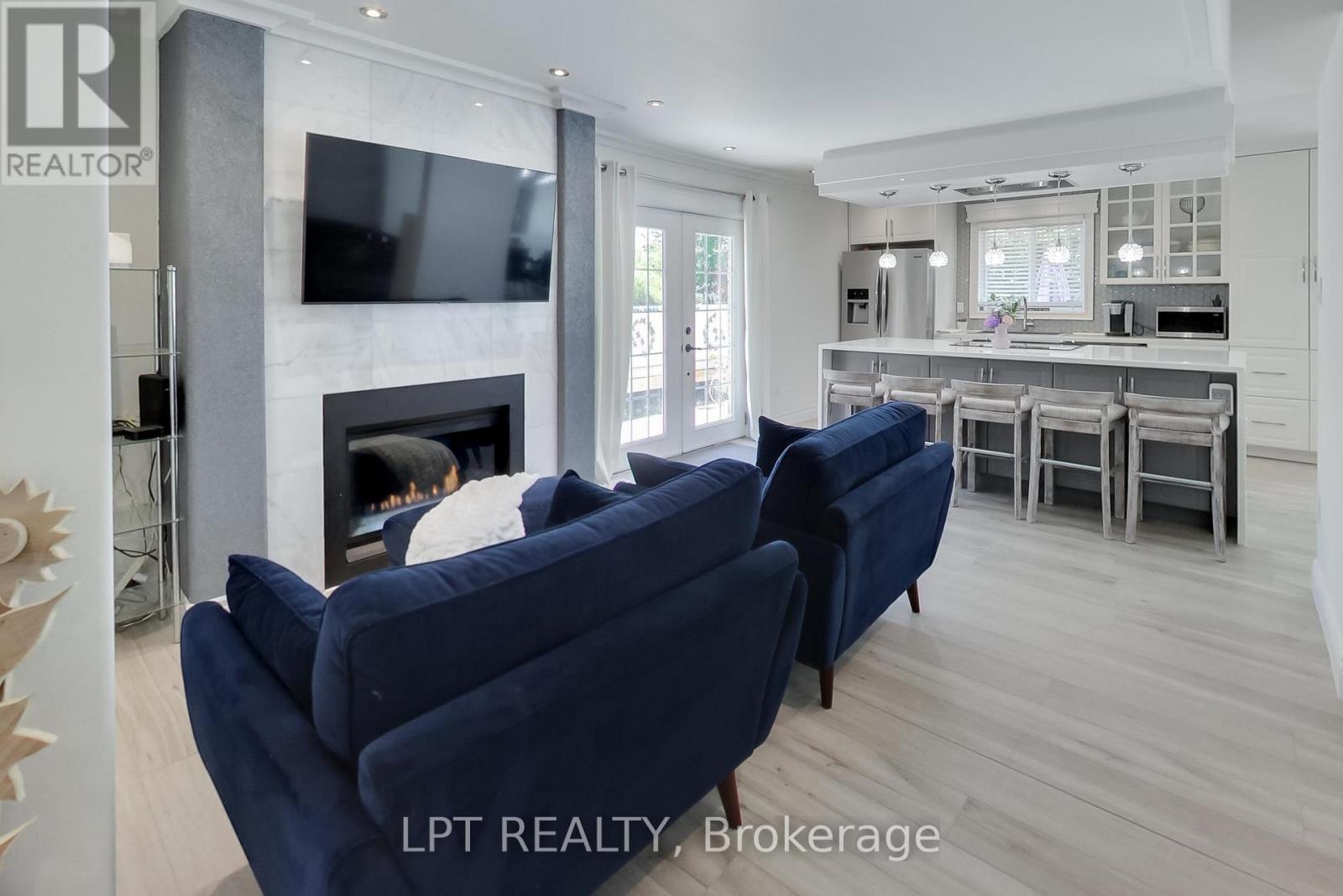 2482 Snowhill Court, Burlington, ON - Indoor Photo Showing Living Room With Fireplace