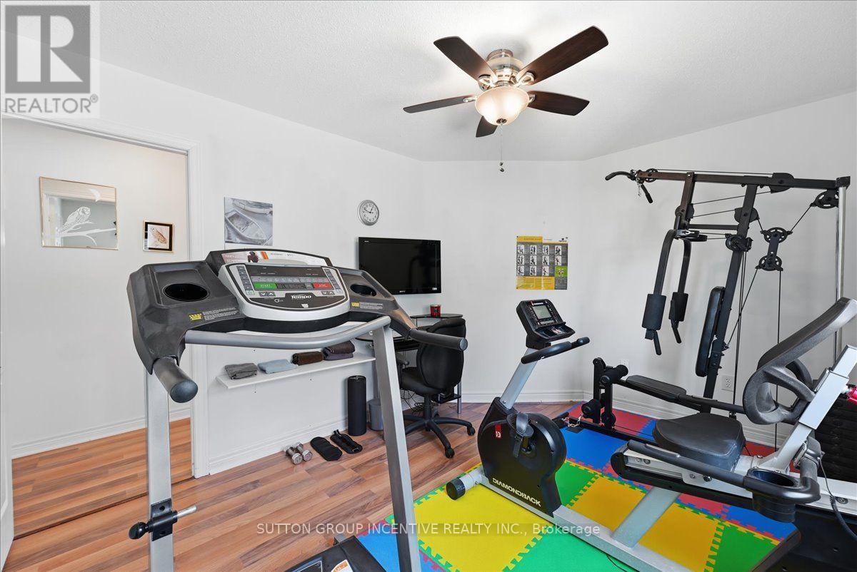 Second floor bedroom (used s exercise area) - 17 White Crescent, Barrie, ON - Indoor Photo Showing Gym Room
