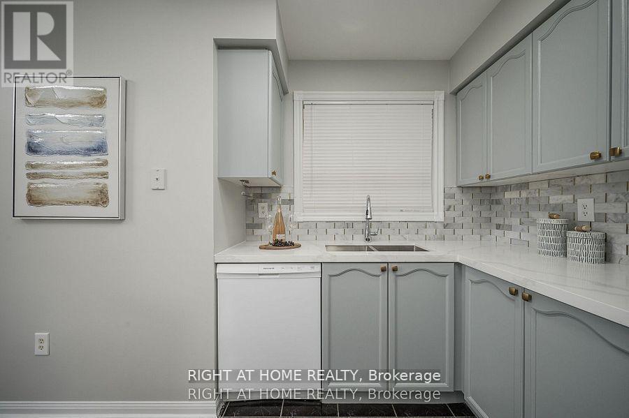 1724 Samuelson Circle, Mississauga, ON - Indoor Photo Showing Kitchen With Double Sink