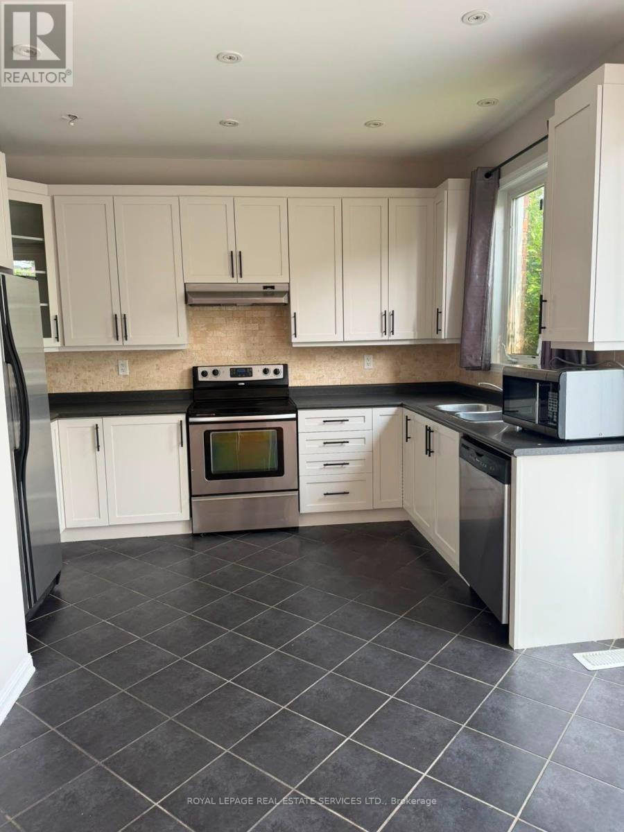 697 Scott Boulevard, Milton, ON - Indoor Photo Showing Kitchen With Stainless Steel Kitchen