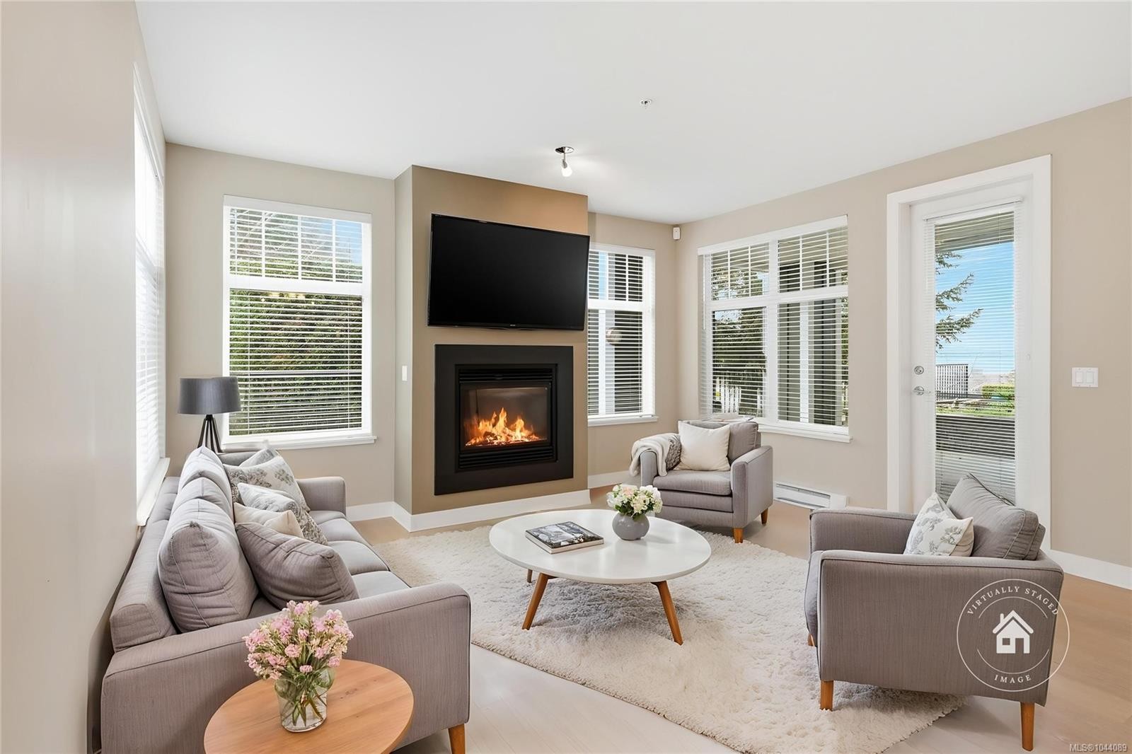 #101-1325 Cape Cod Dr, Parksville, BC - Indoor Photo Showing Living Room With Fireplace