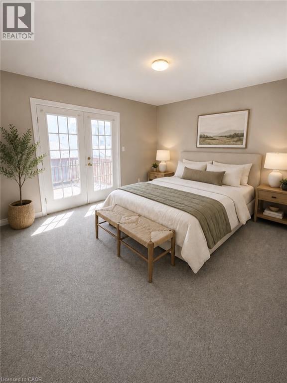 Primary Bedroom w/walkout to back deck - 7 Spitfire Drive, Mount Hope, ON - Indoor Photo Showing Bedroom