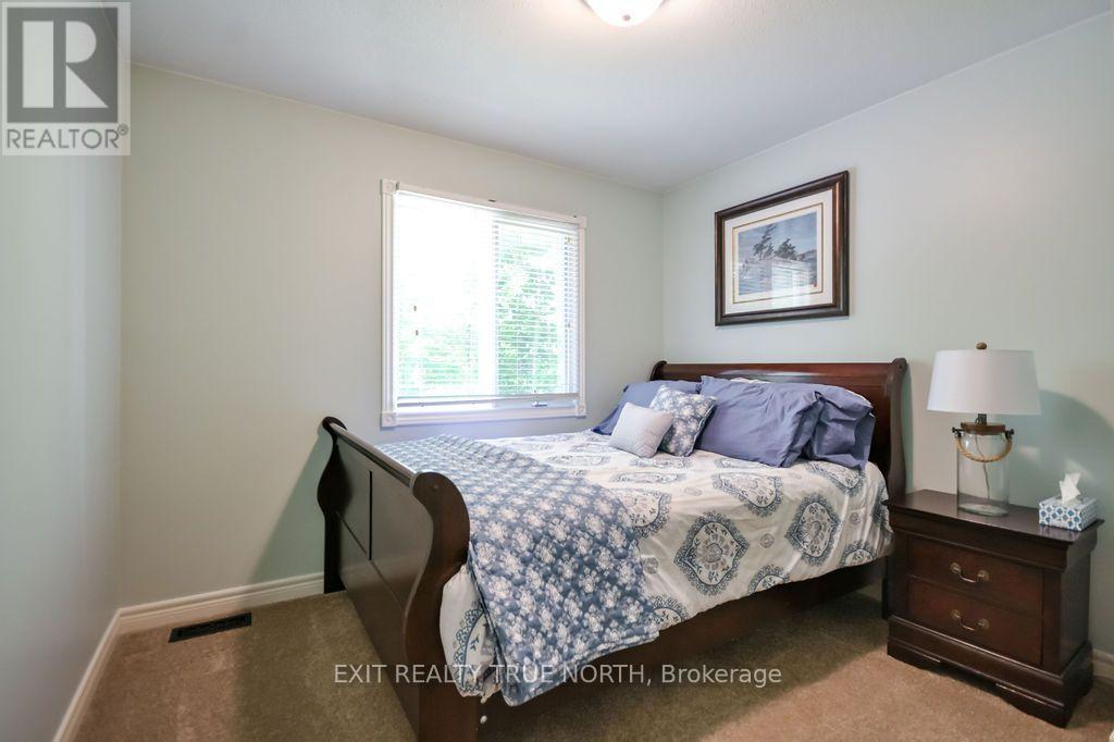 3889 Baseline Road, Springwater, ON - Indoor Photo Showing Bedroom