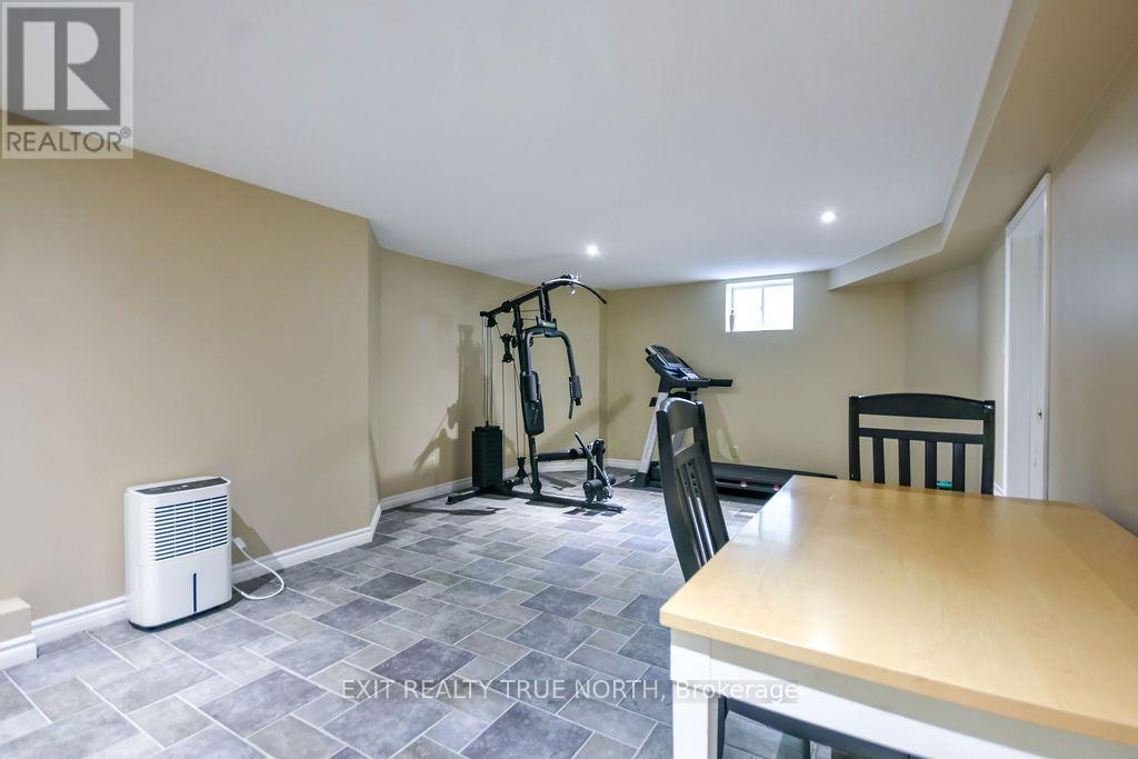 3889 Baseline Road, Springwater, ON - Indoor Photo Showing Gym Room