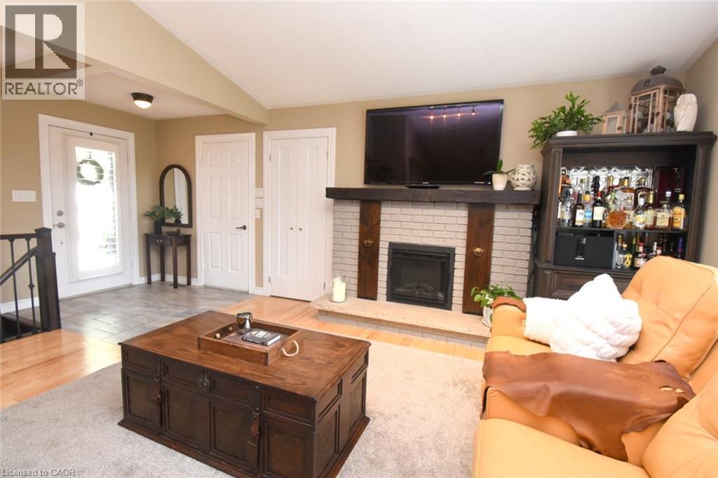 12 Mckeown Court, Caledonia, ON - Indoor Photo Showing Living Room With Fireplace