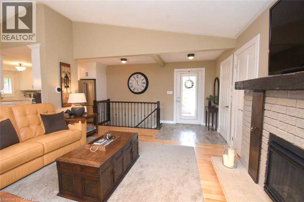 12 Mckeown Court, Caledonia, ON - Indoor Photo Showing Living Room With Fireplace