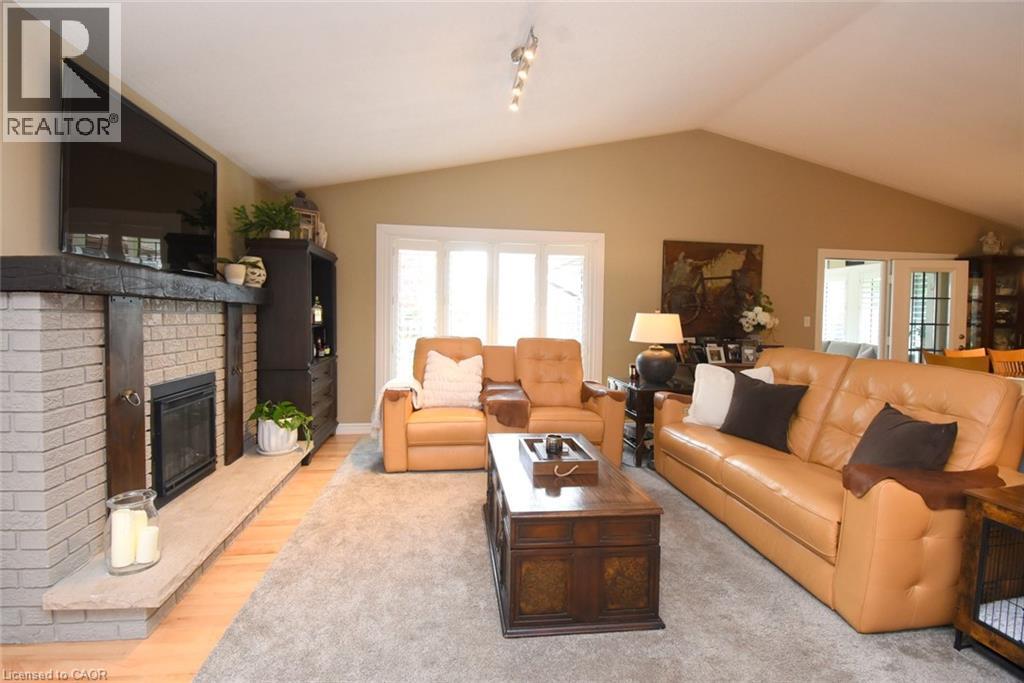12 Mckeown Court, Caledonia, ON - Indoor Photo Showing Living Room With Fireplace