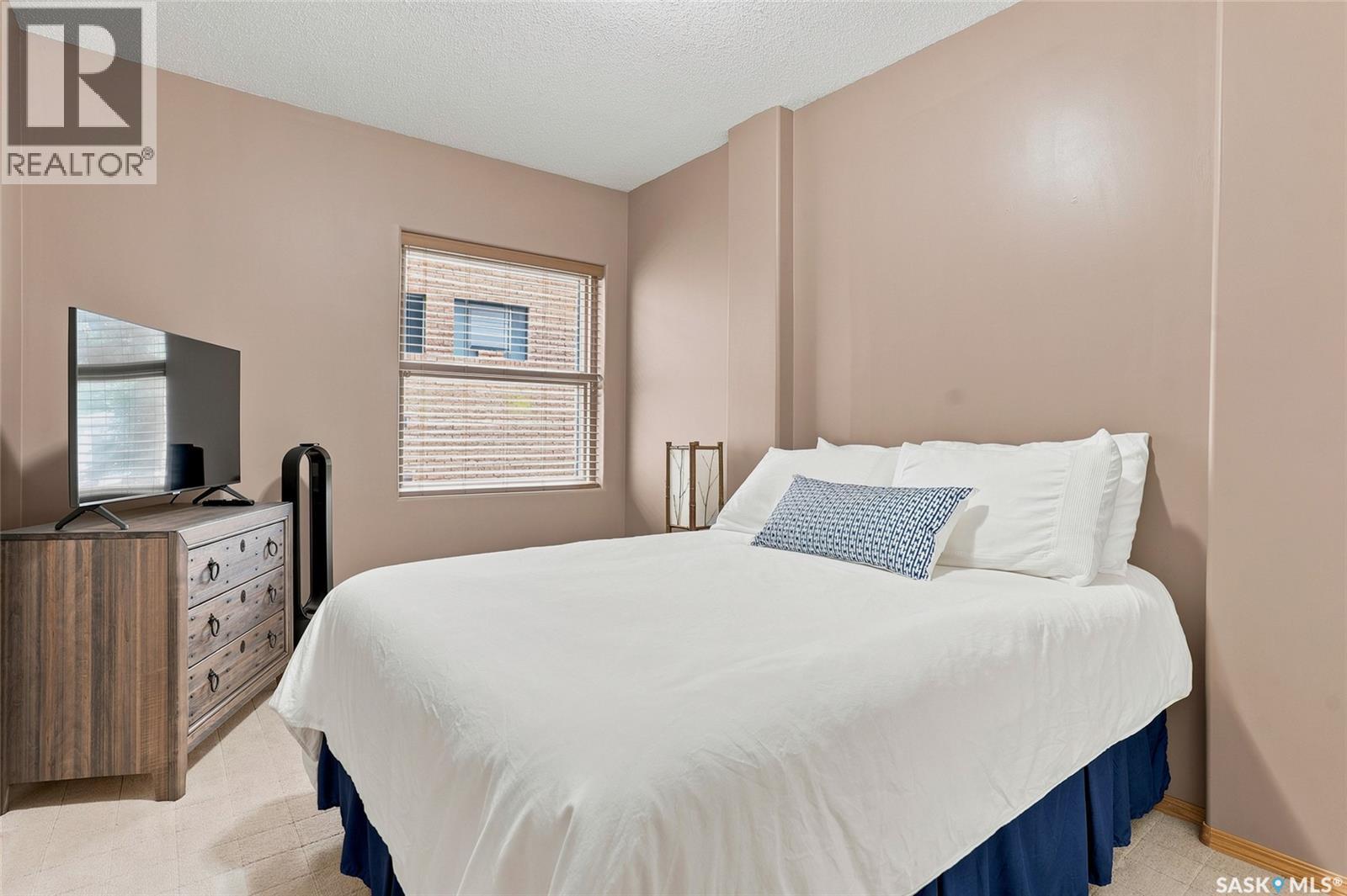 104 303 5Th Avenue N, Saskatoon, SK - Indoor Photo Showing Bedroom