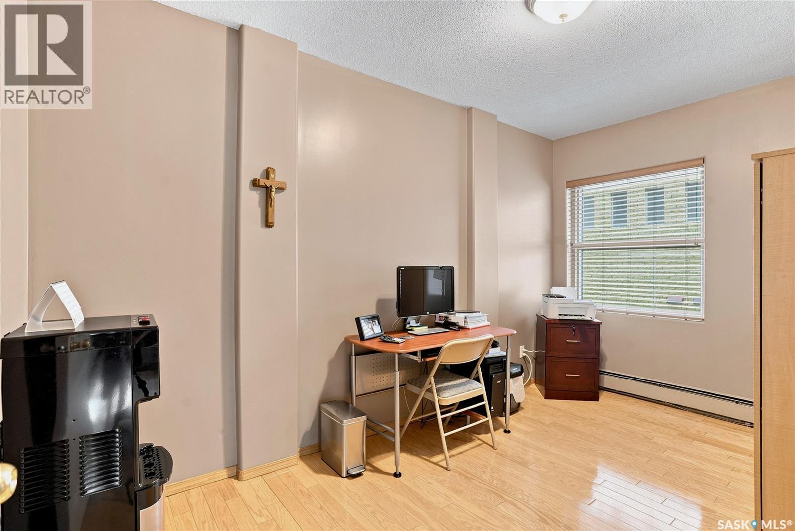 104 303 5Th Avenue N, Saskatoon, SK - Indoor Photo Showing Other Room