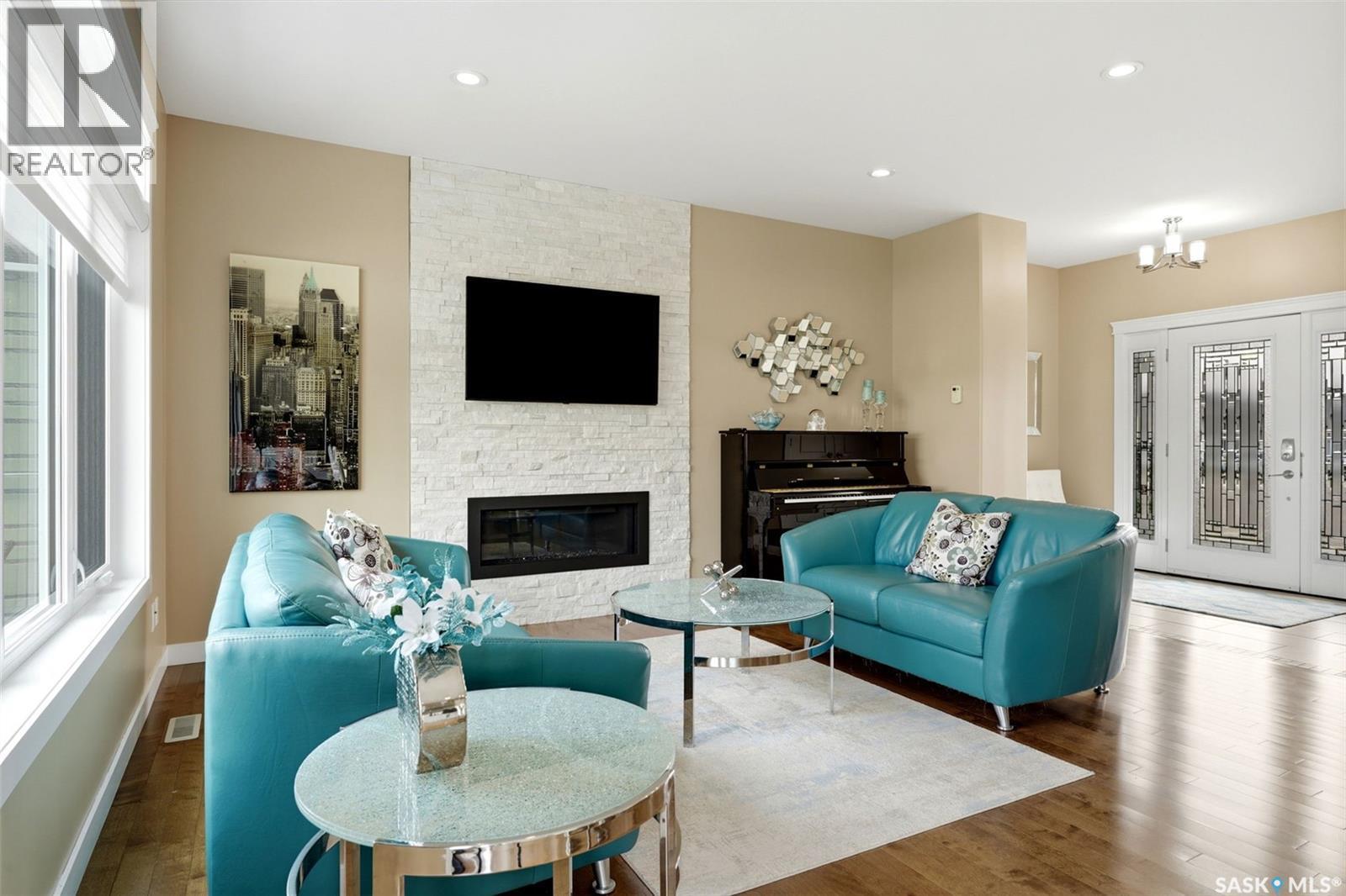 4665 Skinner Crescent, Regina, SK - Indoor Photo Showing Living Room With Fireplace