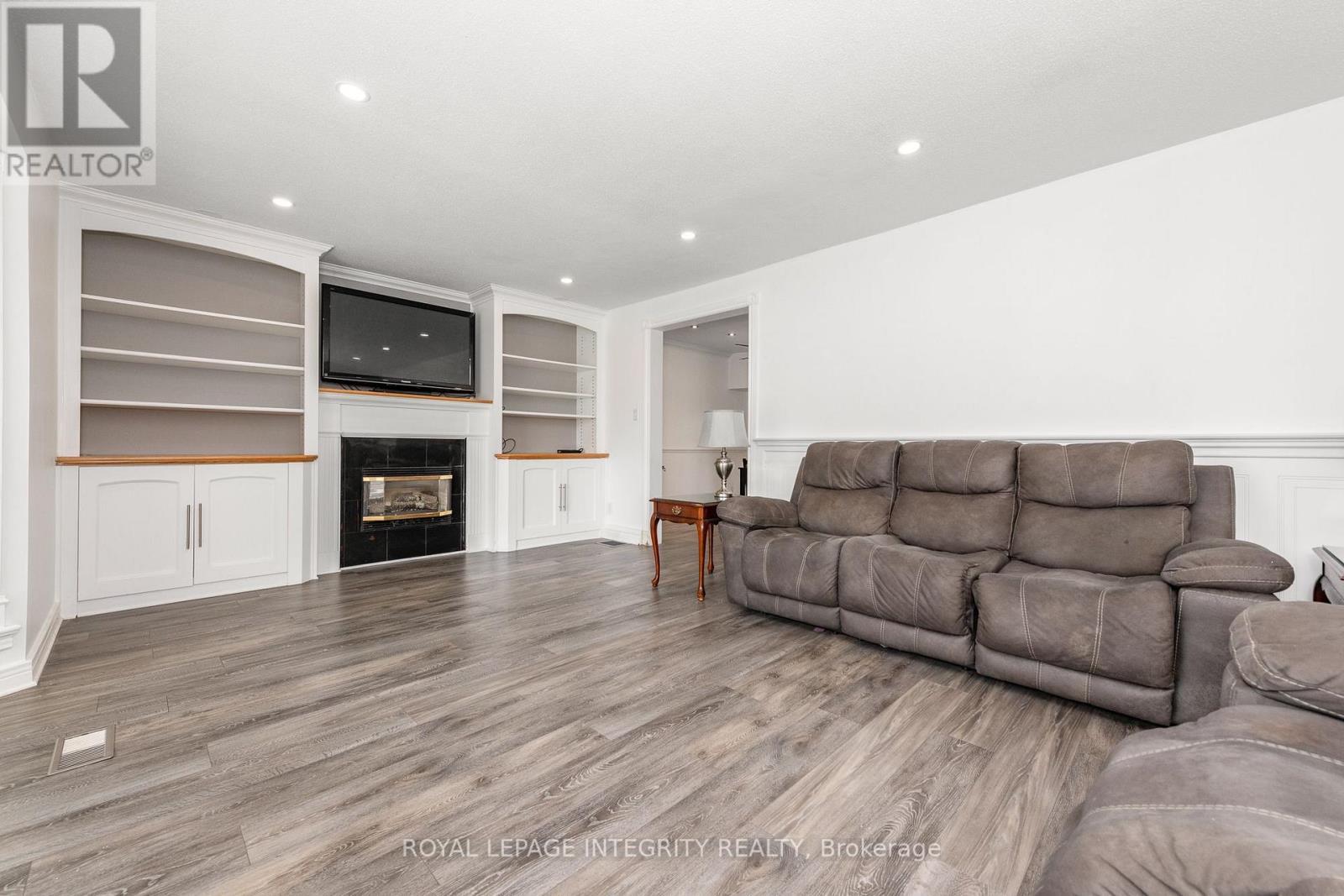 95 Mcclellan Road, Ottawa, ON - Indoor Photo Showing Living Room With Fireplace