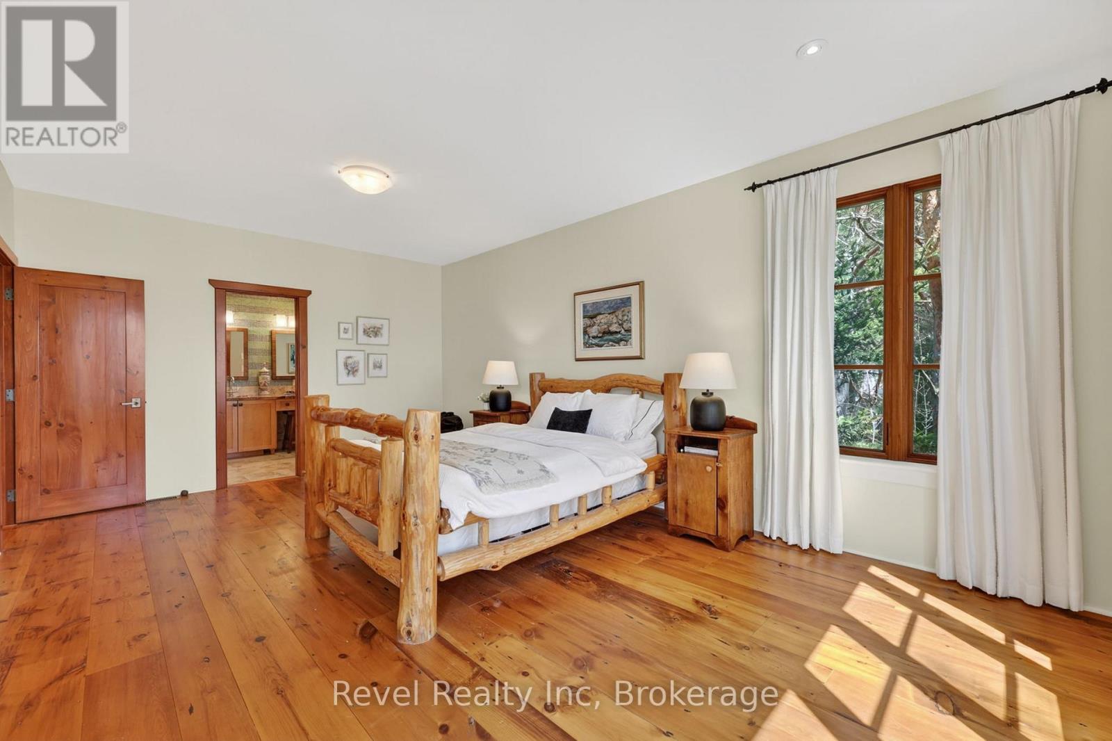 Ensuite and Walk in Closet - 12 Walker Road, Tiny, ON - Indoor Photo Showing Bedroom