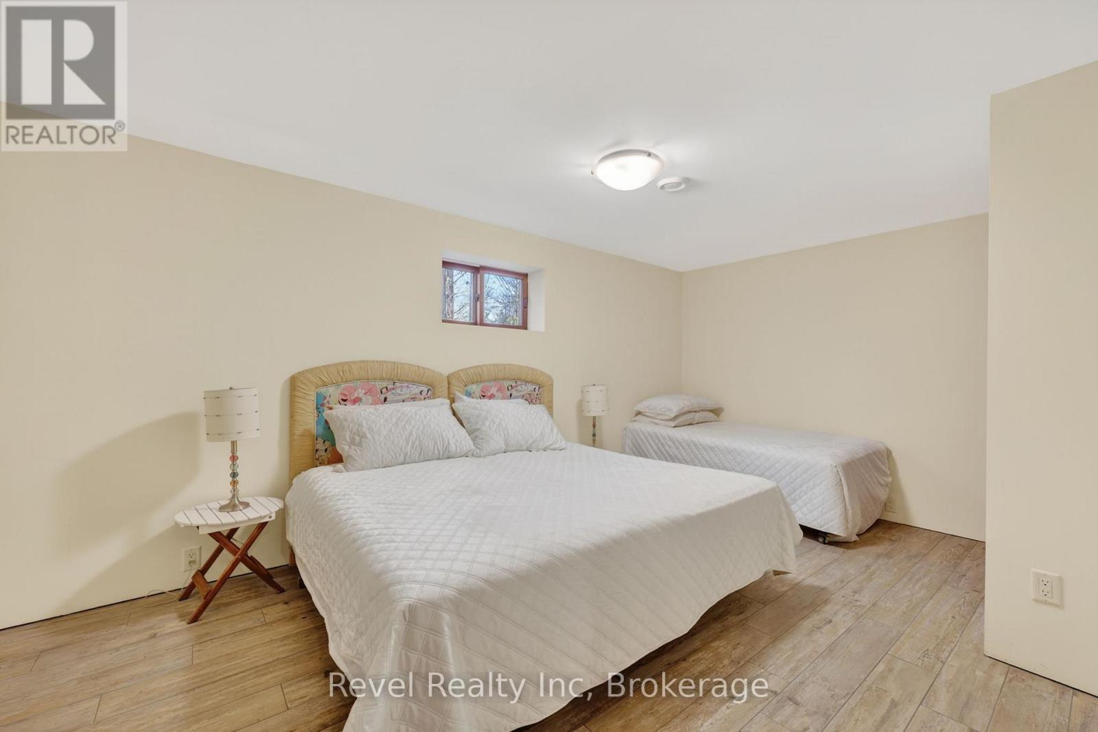 12 Walker Road, Tiny, ON - Indoor Photo Showing Bedroom