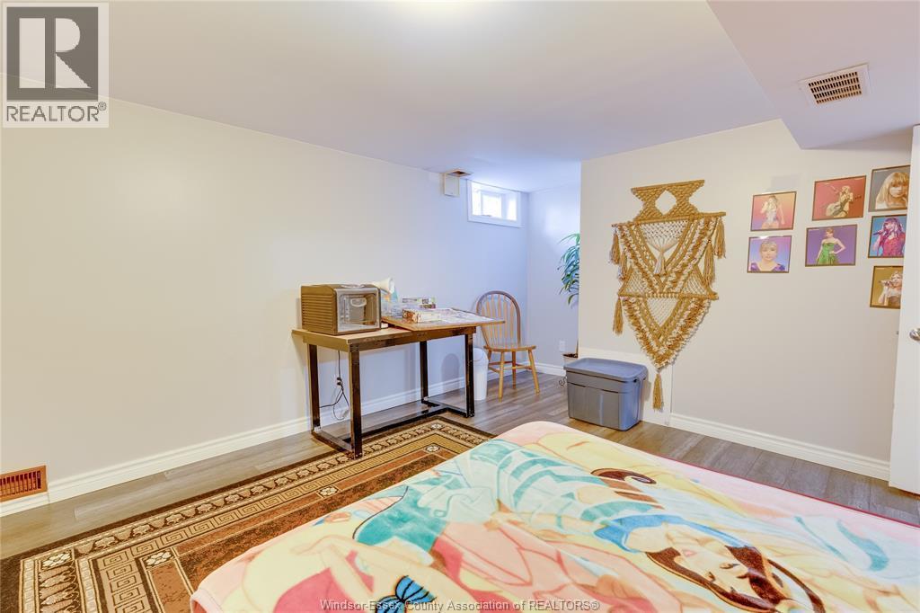 503 Regent, St. Clair Beach, ON - Indoor Photo Showing Bedroom