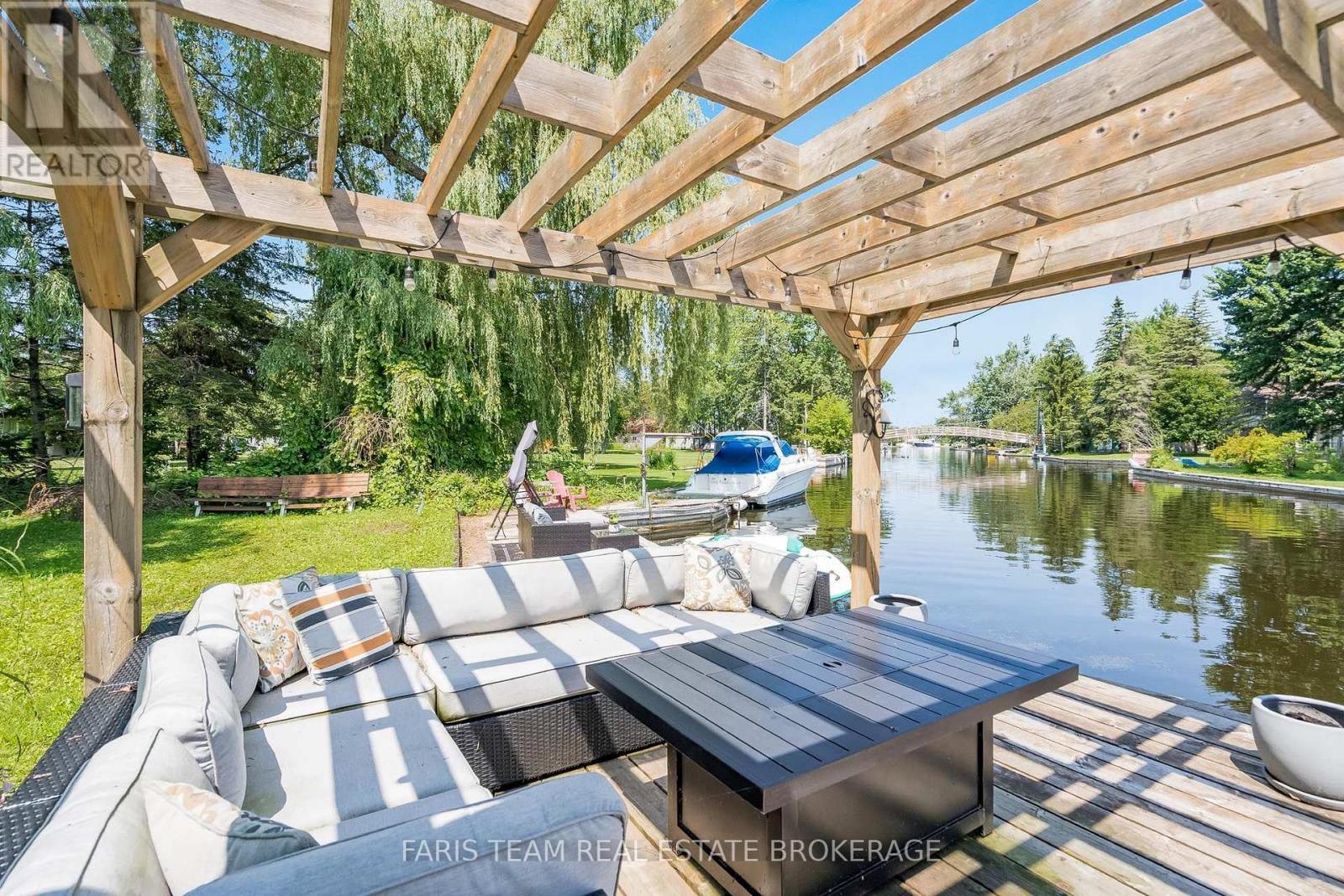 27 Poplar Crescent, Ramara, ON - Outdoor With Body Of Water With Deck Patio Veranda