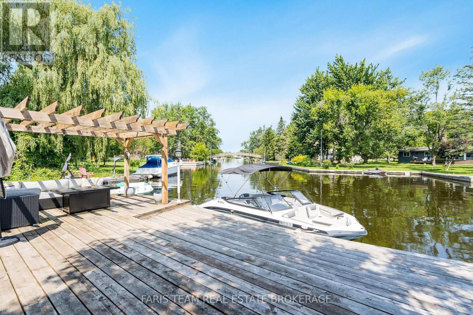 27 Poplar Crescent, Ramara, ON - Outdoor With Body Of Water With Deck Patio Veranda
