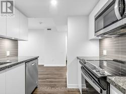 BACKSPLASH WITH OVER-THE-RANGE MICROWAVE - 