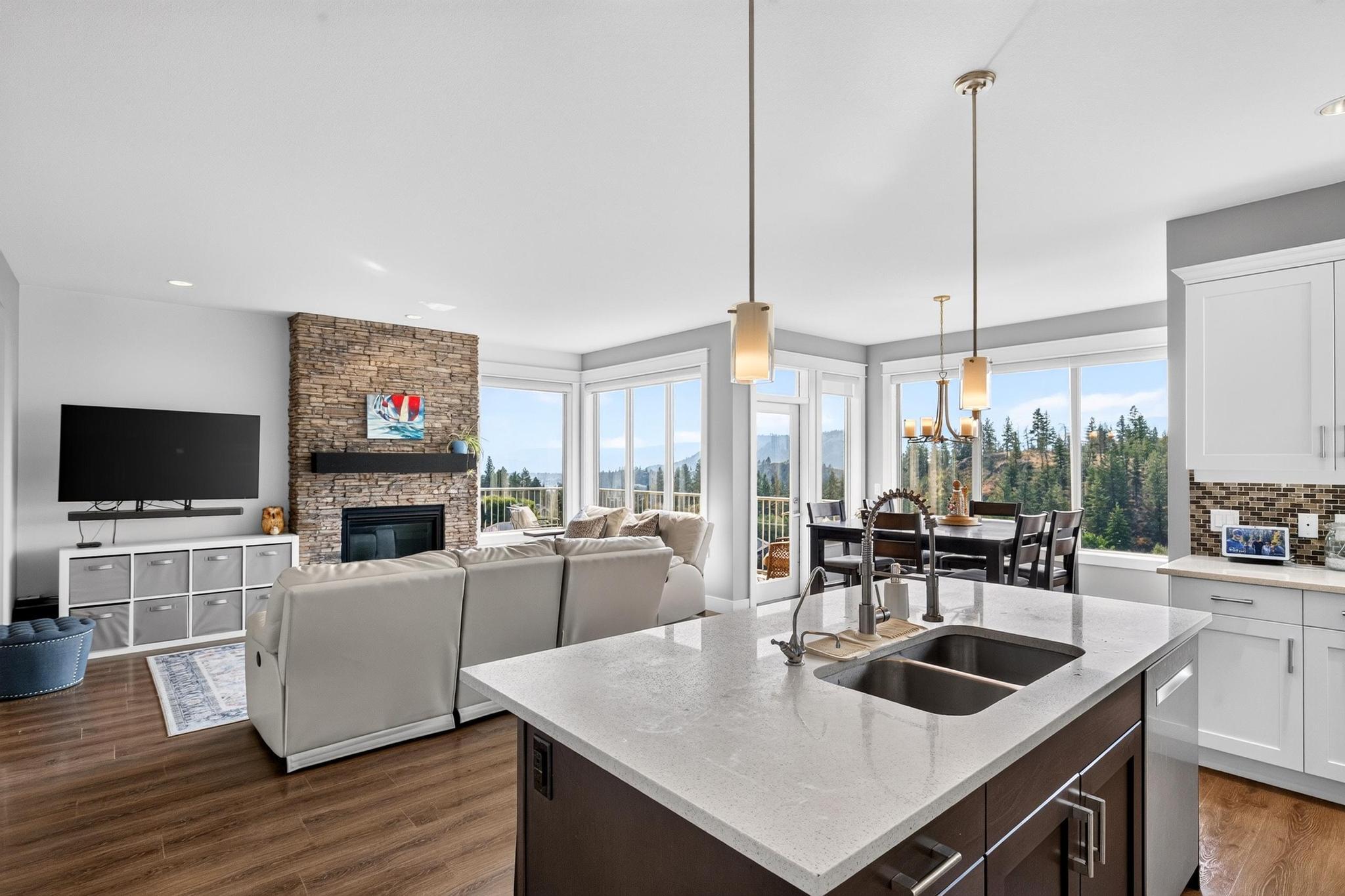 2425 Tallus Heights Drive, West Kelowna, BC - Indoor Photo Showing Kitchen With Fireplace With Double Sink