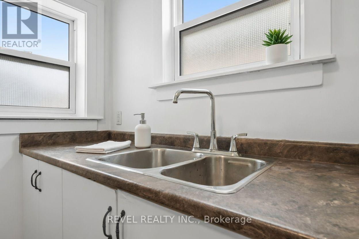 Kitchen - virtually staged - 7 Maple Street, St. Thomas, ON - Indoor Photo Showing Kitchen With Double Sink