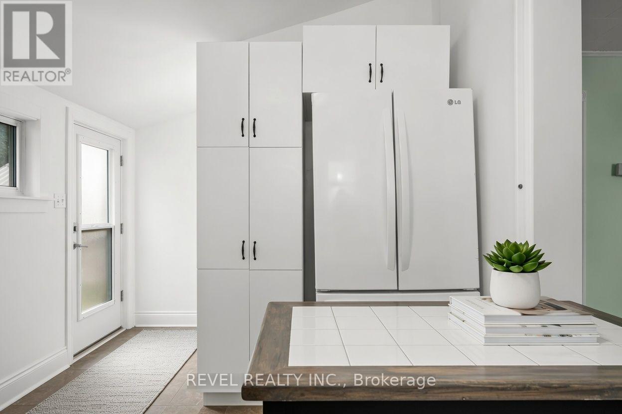 Kitchen - virtually staged - 7 Maple Street, St. Thomas, ON - Indoor Photo Showing Other Room