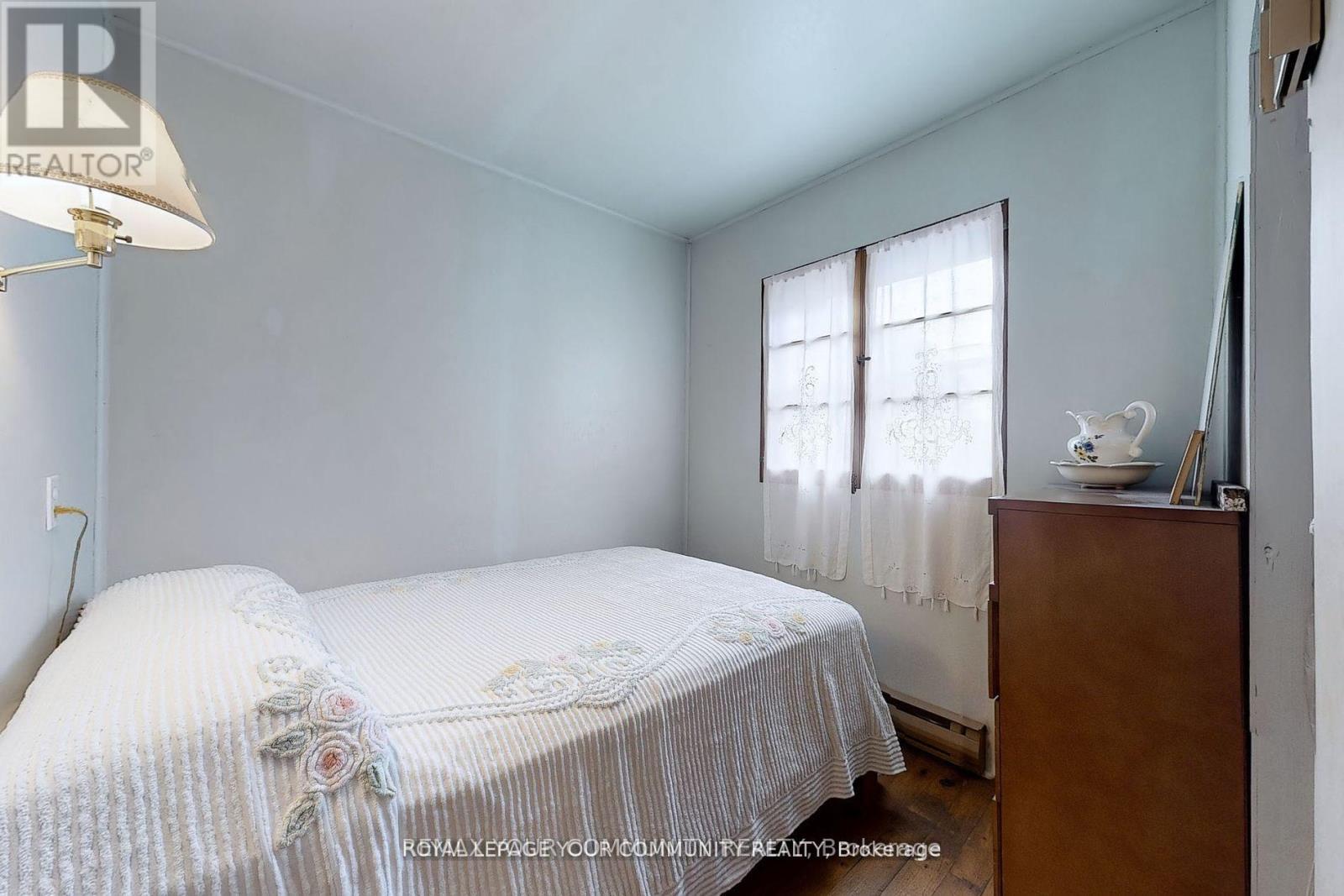 1207 Tiny Beaches Road S, Tiny, ON - Indoor Photo Showing Bedroom