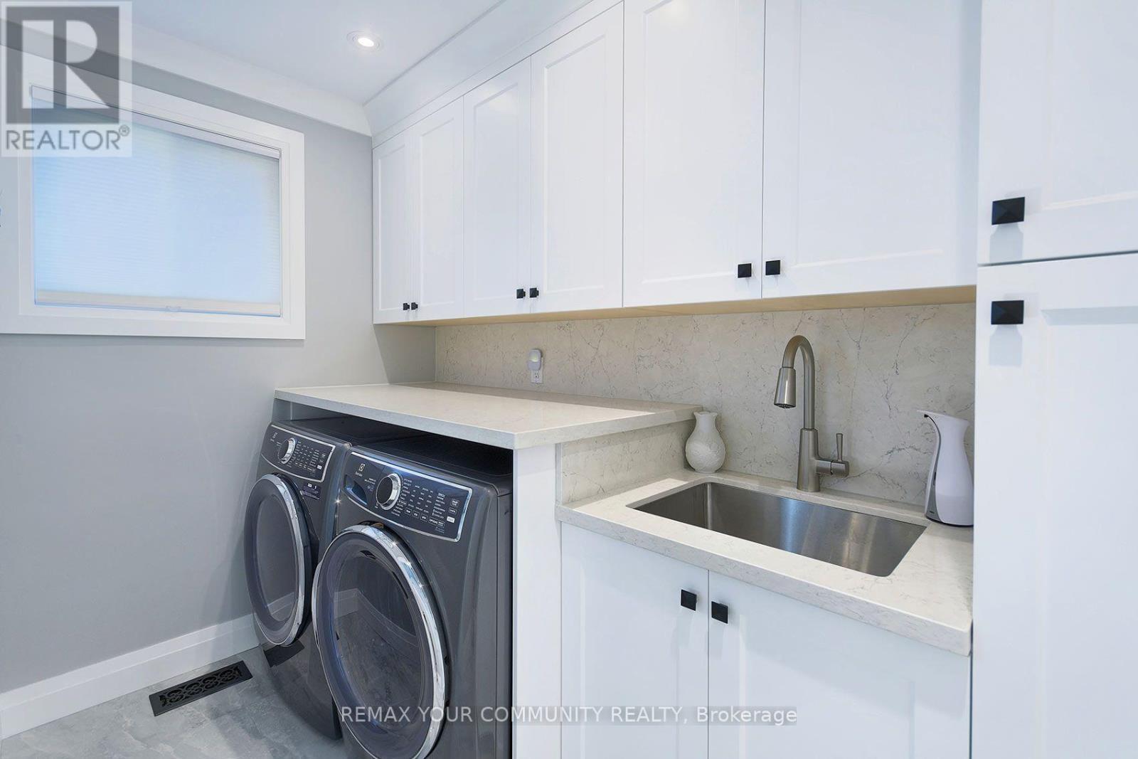 Main Level Laundry - 35 John Dexter Place, Markham, ON - Indoor Photo Showing Laundry Room