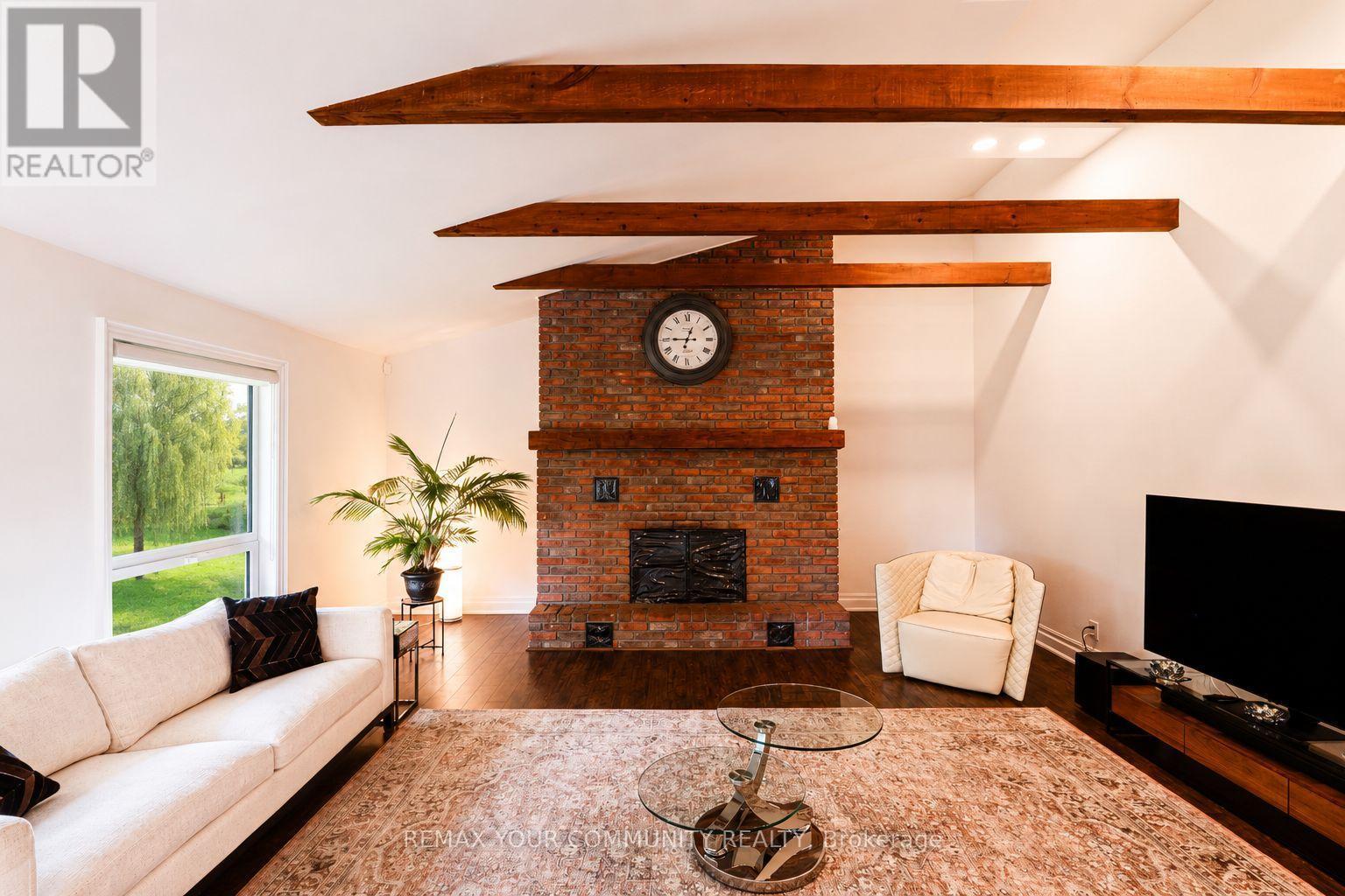 2950 17Th Side Road, King, ON - Indoor Photo Showing Living Room With Fireplace