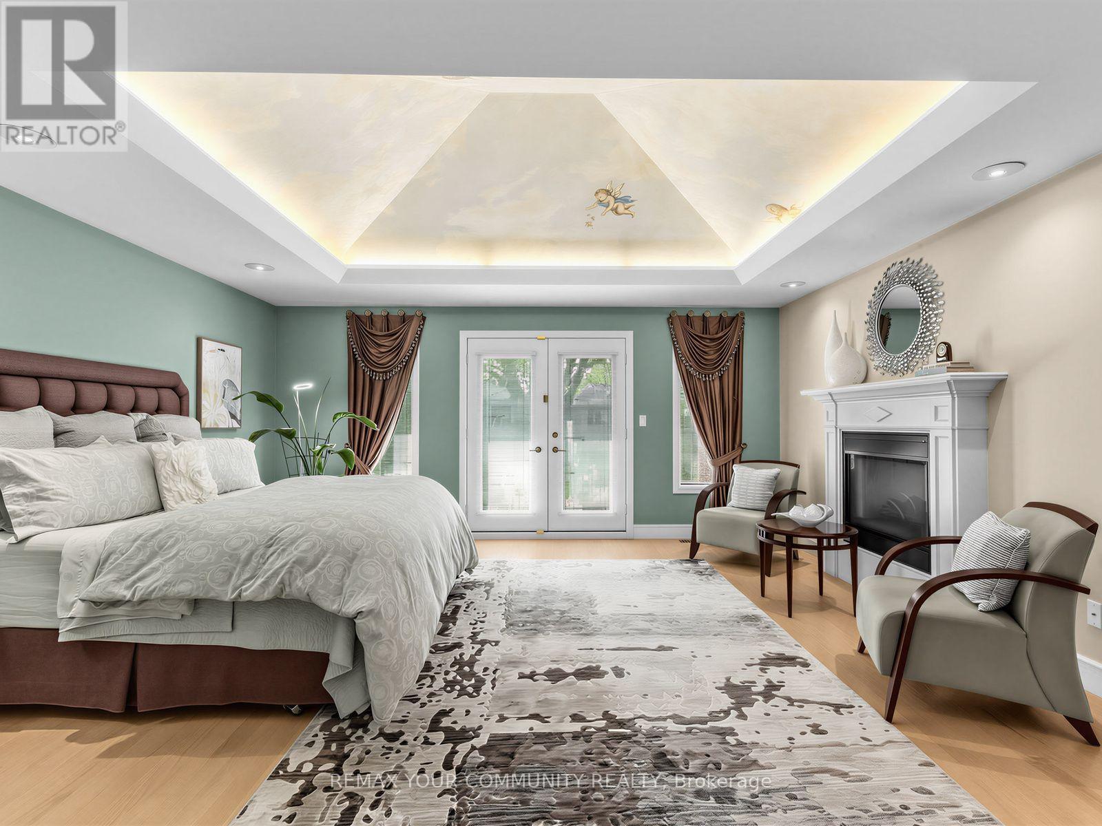 477 Old Orchard Grove, Toronto, ON - Indoor Photo Showing Bedroom With Fireplace