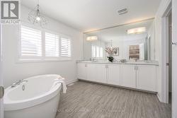 Luxury 5-piece ensuite with oval soaker corner tub - 