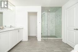Spa-inspired frameless glass shower & water closet - 