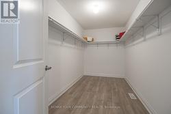 Huge walk-in closet for all your storage needs - 