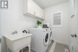 Convenient 2/F laundry w/upgraded front loaders - 