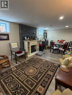 Finished interior space featuring wood-finish flooring and recessed lighting - 